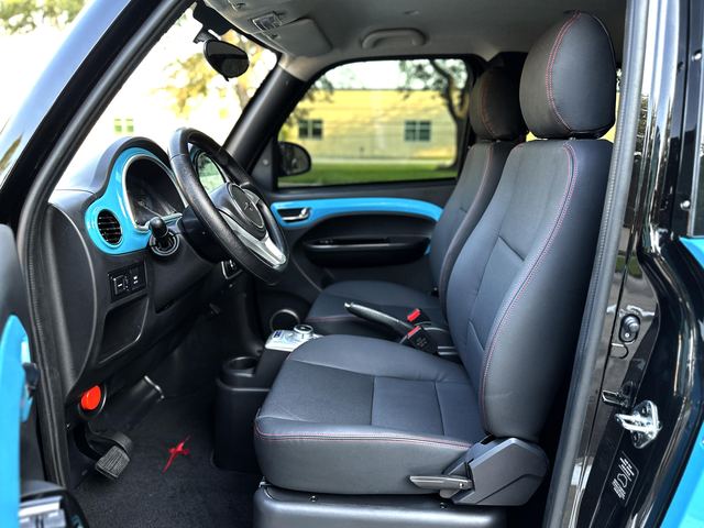 REV M2 front seat with door open