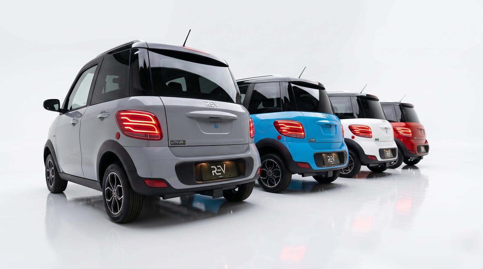 REV M2 rear view shown in slate gray, aqua blue, polar white, and passion red